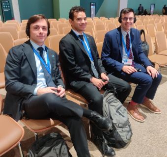 From left to right: Quinten Smith, John Dennis, and Justin Alexander. UM law students working with the Federated States of Micronesia at Week 2 of COP 29