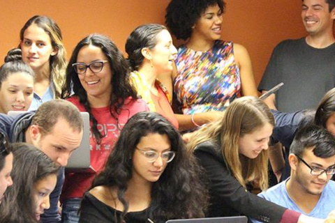 Group of students working and laughing
